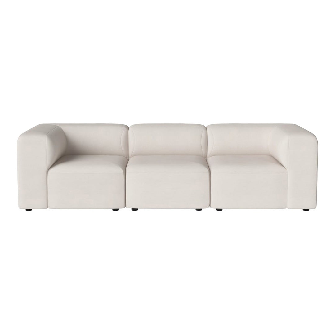 Beige modular sofa with a smooth, textured surface and clean, minimalist lines. Ideal for modern decor.
