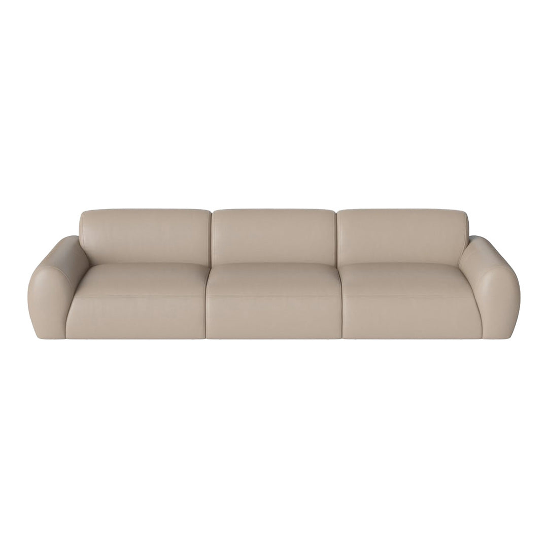 Beige leather sofa with smooth, minimalist design and subtle curves, perfect for modern interiors.