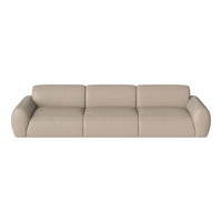 Beige leather sofa with smooth, minimalist design and subtle curves, perfect for modern interiors.