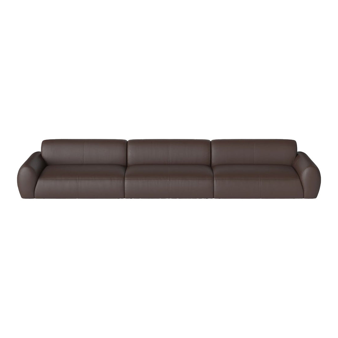 Brown leather sectional sofa with a sleek, modern design and minimalistic smooth texture. Perfect for contemporary interiors.