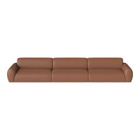 "Modern brown leather sofa with smooth texture and minimalist design, perfect for contemporary interiors."