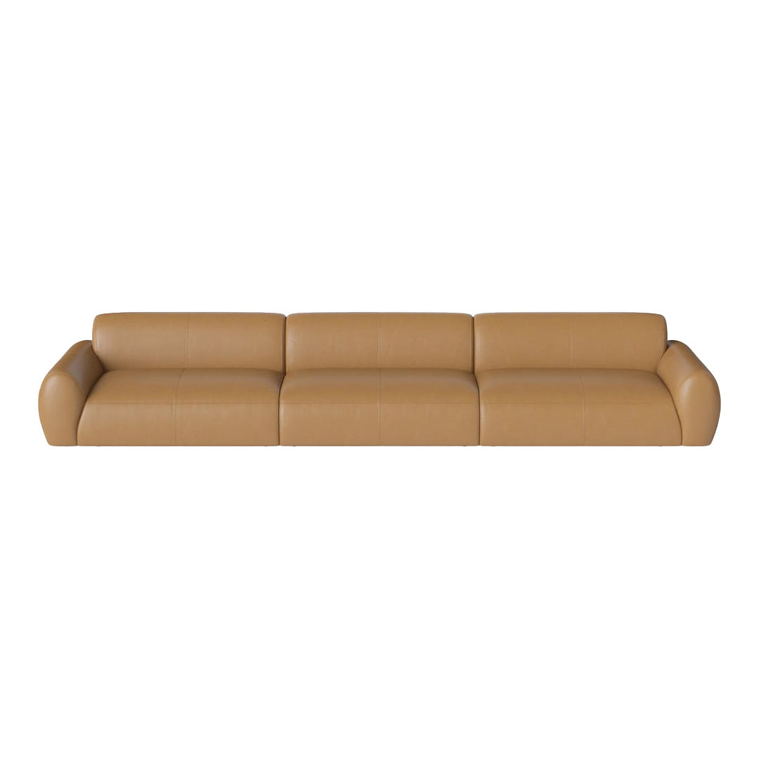 Light brown leather sofa with smooth, minimalist design and rounded edges, perfect for modern interiors.