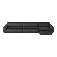 Black leather sectional sofa with smooth, modern lines and subtle stitching details. Perfect for contemporary living spaces.