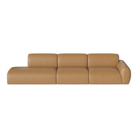 Modern tan leather sofa with smooth, minimalist design and subtle curves, perfect for contemporary interiors.