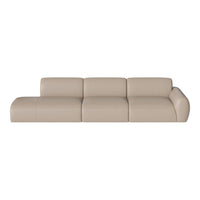 Beige leather sectional sofa with smooth, minimalist design and subtle curved armrest. Perfect for modern decor.