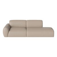 Beige leather sectional sofa with smooth, modern lines and a minimalist design. Perfect for contemporary decor.