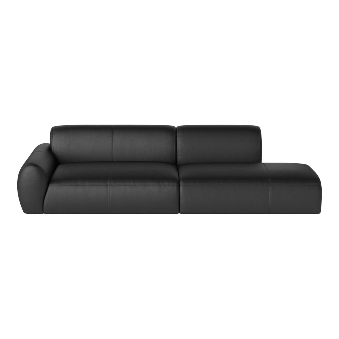 Stylish black leather sectional sofa with a sleek, modern design and minimalistic lines. Perfect for any contemporary space.