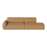 Tan leather sofa with smooth, matte finish and minimalist design. Perfect for modern decor.