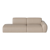 Beige leather sectional sofa with smooth, minimalist design and subtle seam details. Perfect for modern interiors.