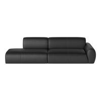Black leather sectional sofa with smooth, matte finish and minimalistic design. Ideal for modern interiors.