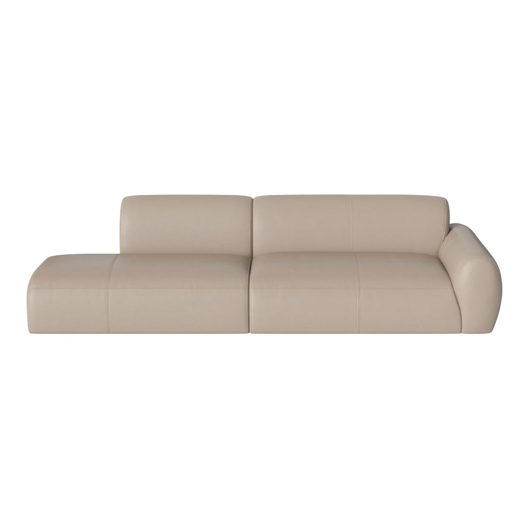 Beige leather sofa with smooth, minimalistic design and subtle stitching patterns on a white background.