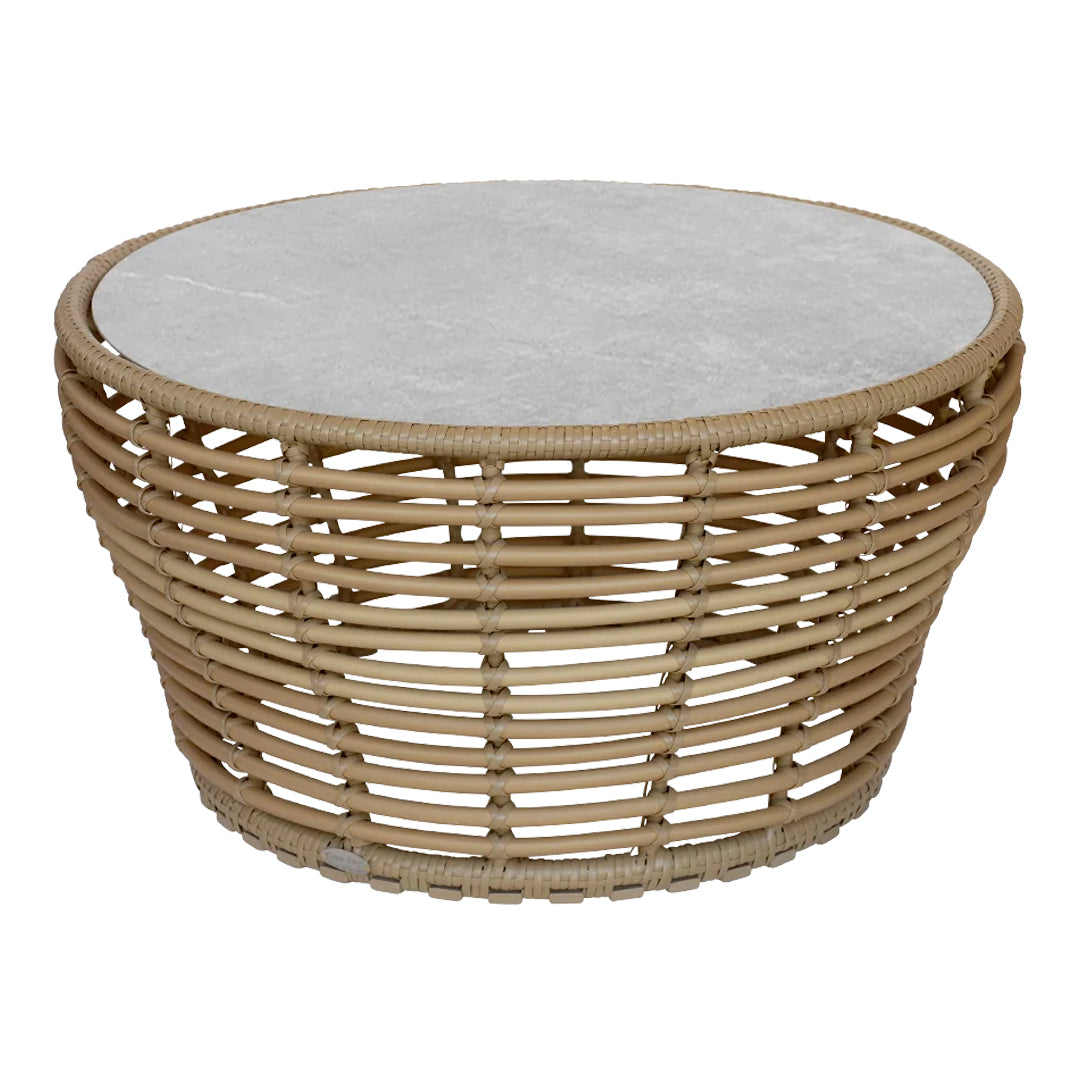 Round basket weave coffee table with a natural bamboo base and smooth gray stone top. Perfect for rustic decor.