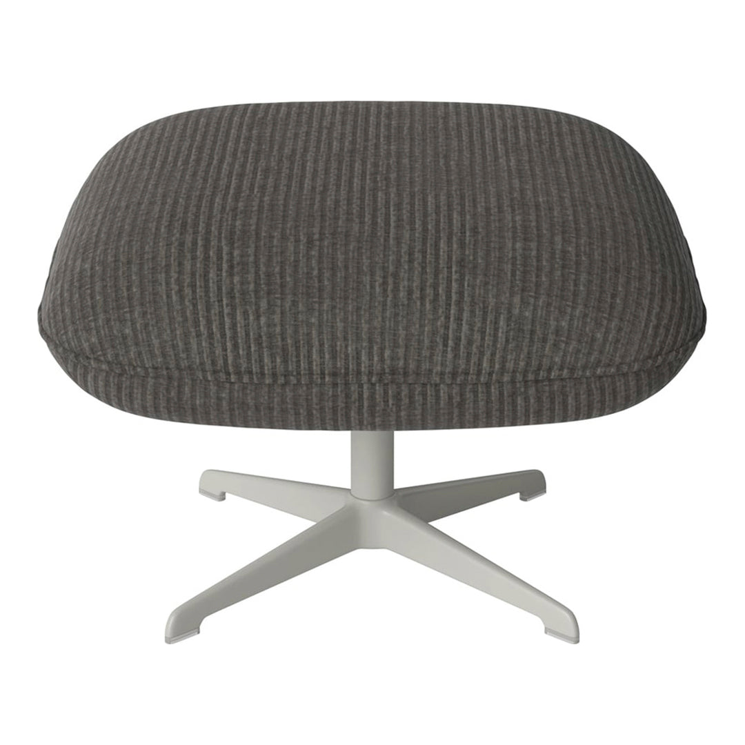 Gray ribbed ottoman with a smooth white base, adding a modern touch to any living space.