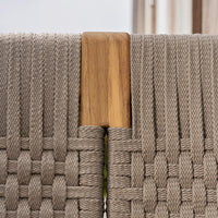 Beige woven texture with wooden accent, showcasing a subtle, modern design for stylish outdoor decor.