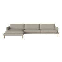 Modern grey sectional sofa with sleek lines and light wood legs, featuring a minimalist design and subtle texture.