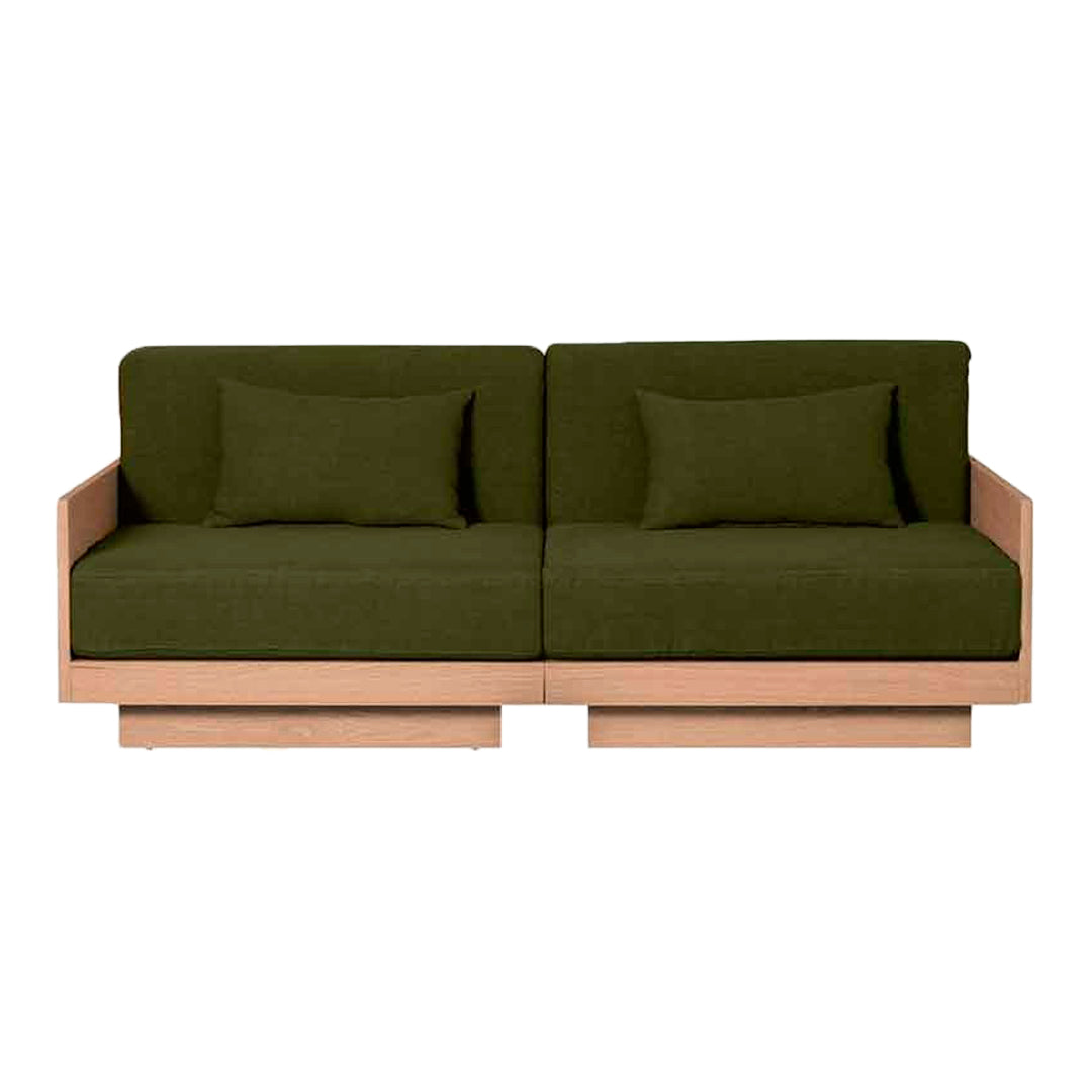 Olive green sofa with plush cushions and wooden frame, modern design, perfect for stylish living spaces.