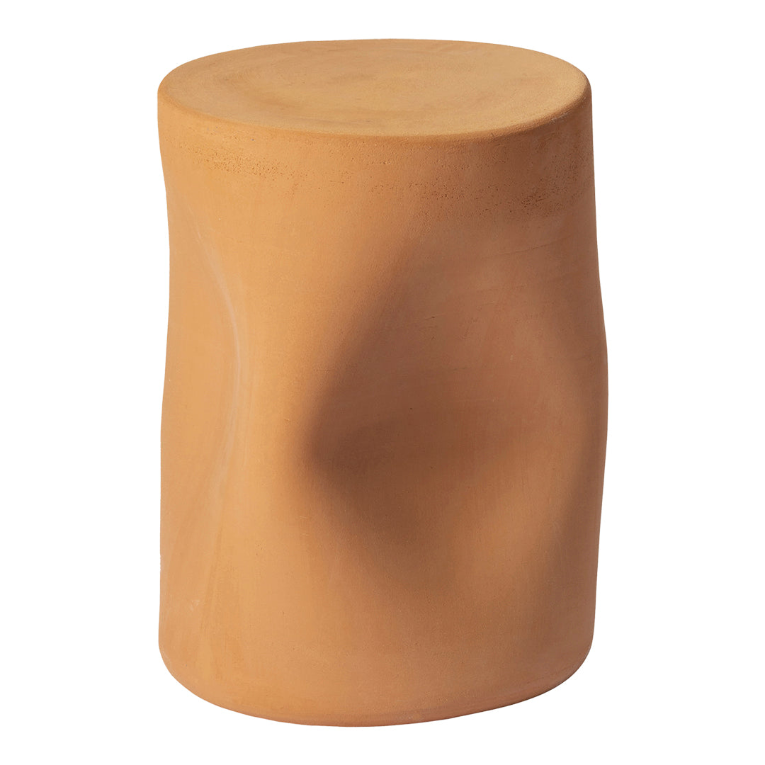 "Terra cotta stool with a smooth, sculptural surface and warm, earthy tones."