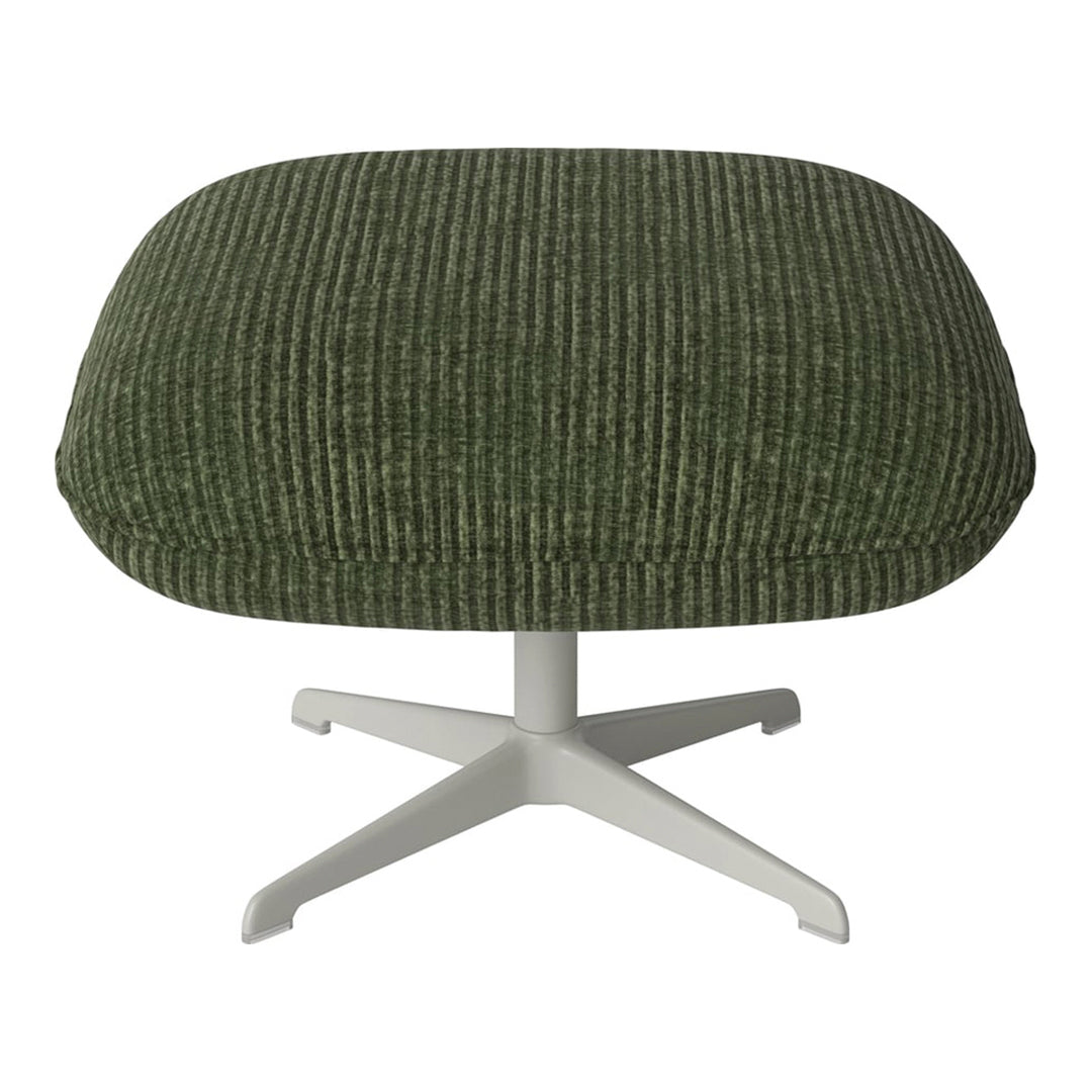 Olive green ribbed ottoman with a sleek white base, offering a modern aesthetic for any decor.