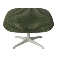 Olive green ribbed ottoman with a sleek white base, offering a modern aesthetic for any decor.