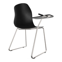 Black chair with sleek lines and a minimalist design, featuring a silver metal frame and integrated writing surface.