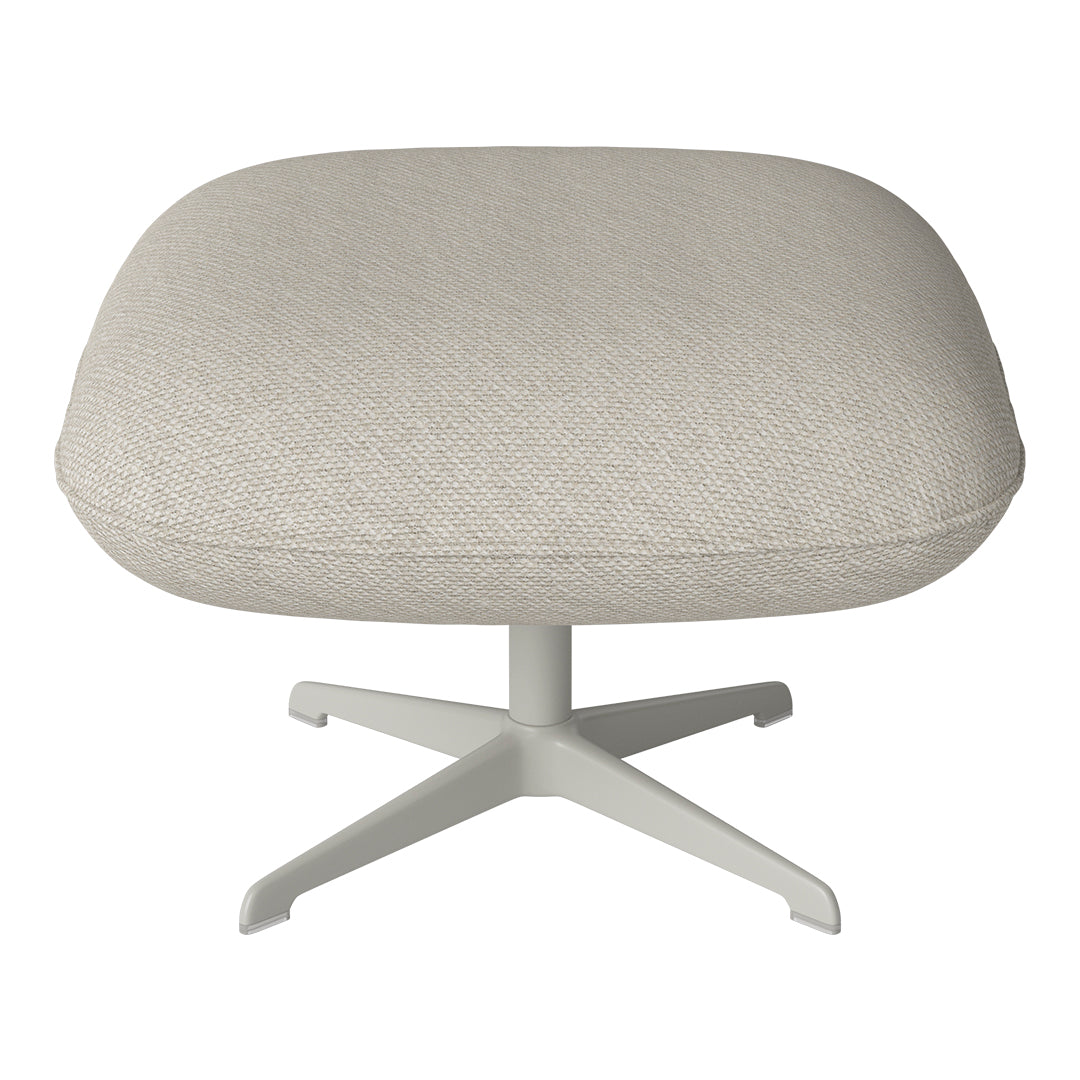 Light beige round ottoman with textured woven pattern on a sleek white pedestal base. 