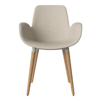 Beige textured chair with light wood legs and gray accents, perfect for modern decor.