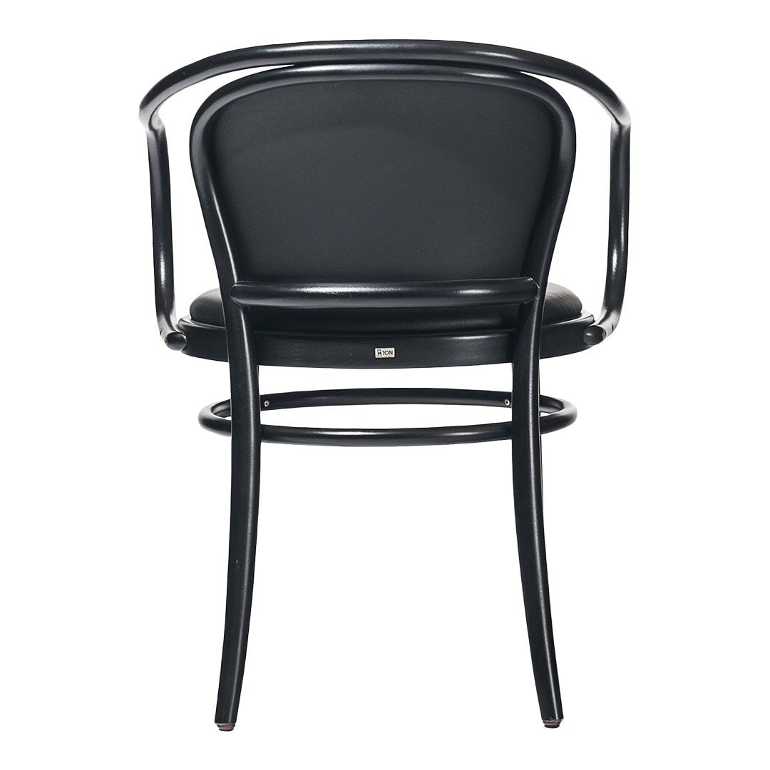 Black bentwood chair with a sleek, minimalist design, featuring a smooth, curved back and simple armrests.