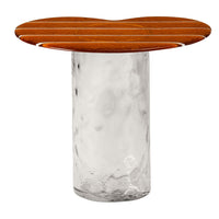 Clear glass base with a warm, wooden top featuring light and dark striped patterns. Modern and stylish design.