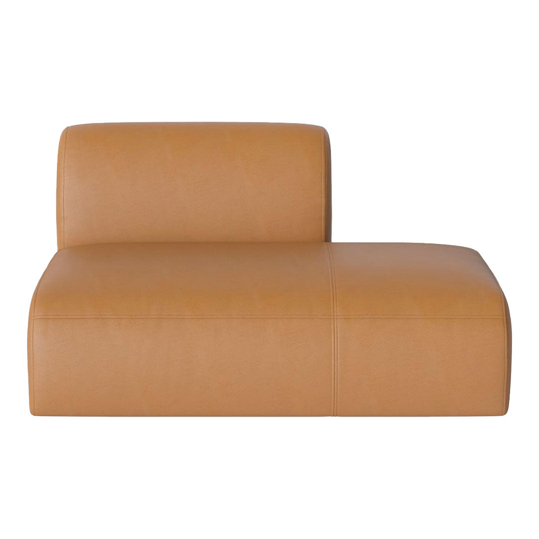 Tan leather chaise lounge with a smooth, minimalist design and subtle stitch detailing.