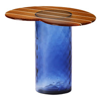 Round wood top with brown and white stripes on a cylindrical blue glass base, creating a vibrant and modern look.