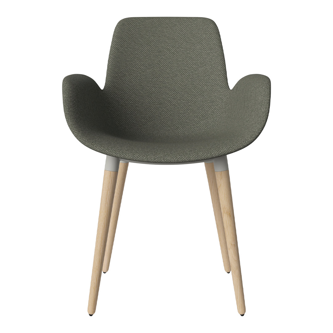 Green textured chair with natural wood legs and subtle gray accents. Perfect for modern home decor.