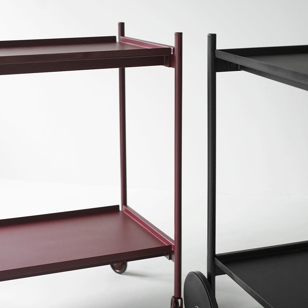 Two rolling carts: one in deep burgundy with a matte finish, the other sleek black with a glossy look.