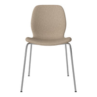 Beige textured chair with a smooth, modern design and sleek silver legs. Perfect for contemporary decor.