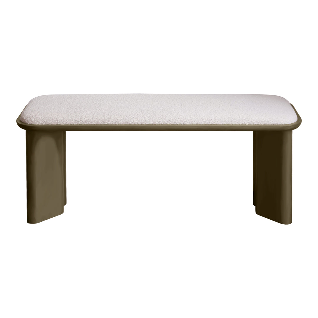 Beige upholstered bench with a smooth, rounded design and contrasting light frame. Modern minimalist style.