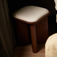 Soft beige upholstered top with rich brown wood legs, featuring a minimalist design. Ideal for any modern space.
