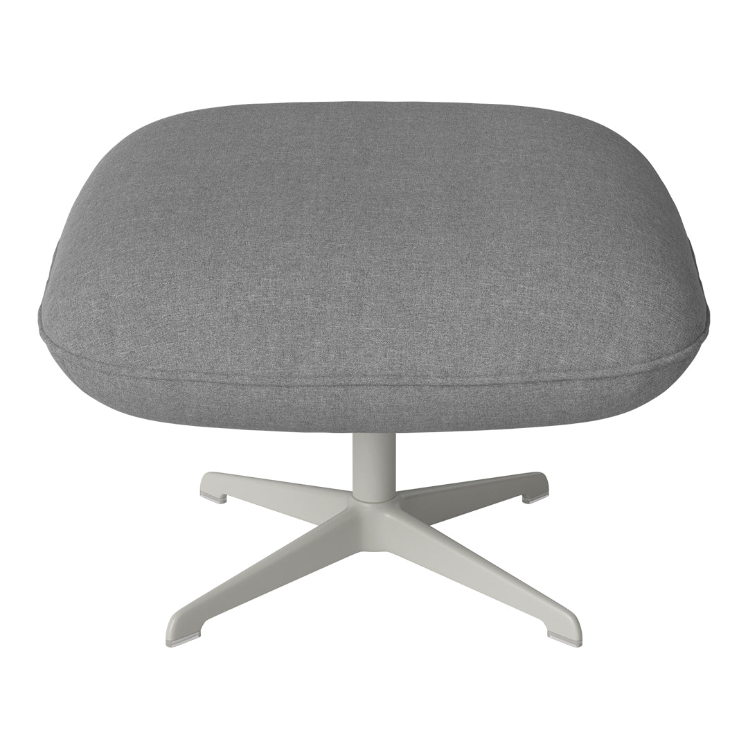 Gray upholstered ottoman with a soft texture and modern white base, ideal for contemporary decor.