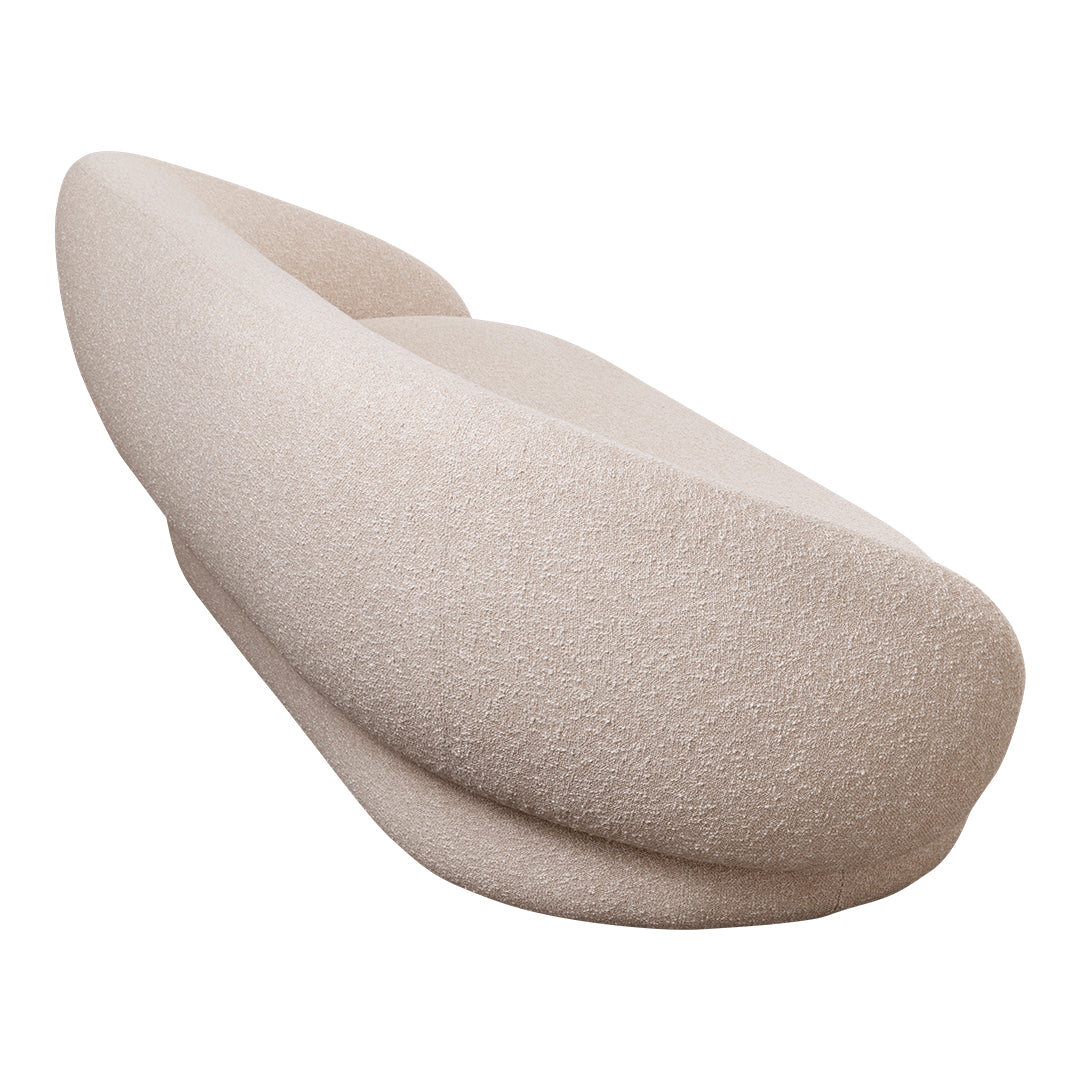 "Beige textured sofa with soft curves and a subtle, airy pattern, perfect for modern interiors."
