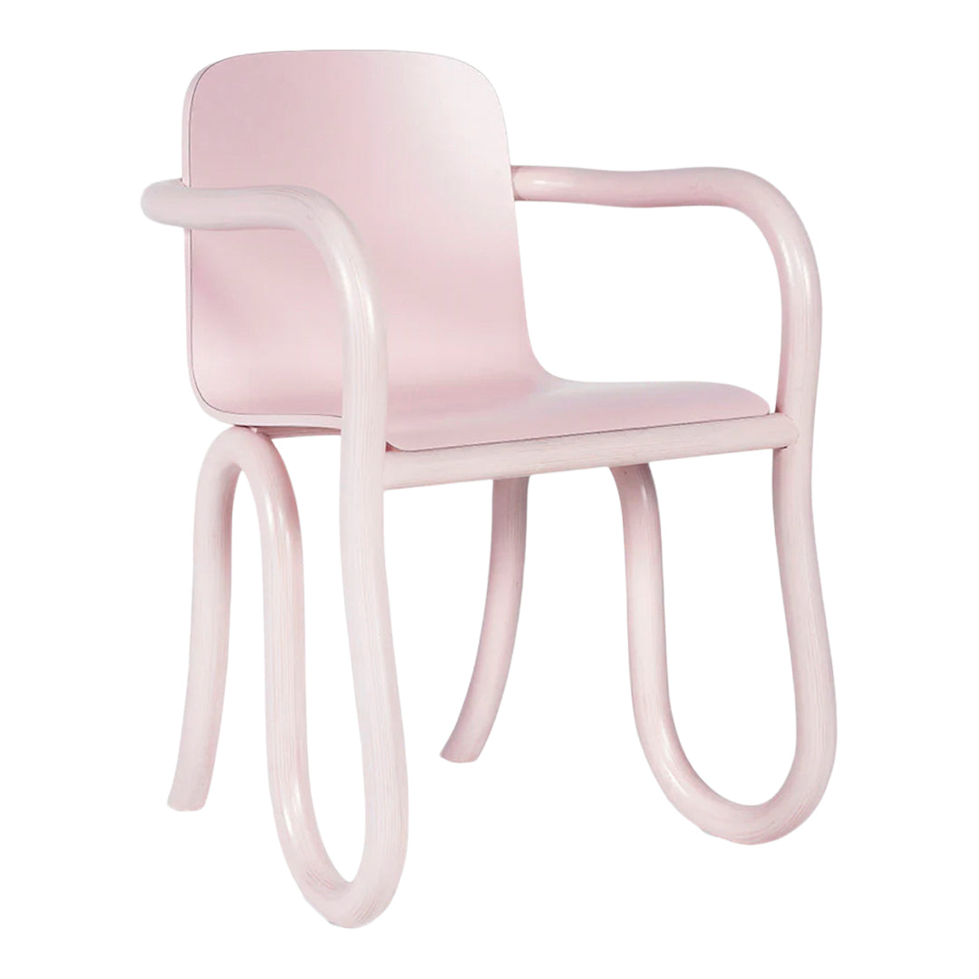 Light pink modern chair with smooth curves and a minimalistic design, perfect for stylish home decor.