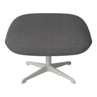 Gray upholstered ottoman with a modern design featuring a subtle textured pattern and a sleek white base.