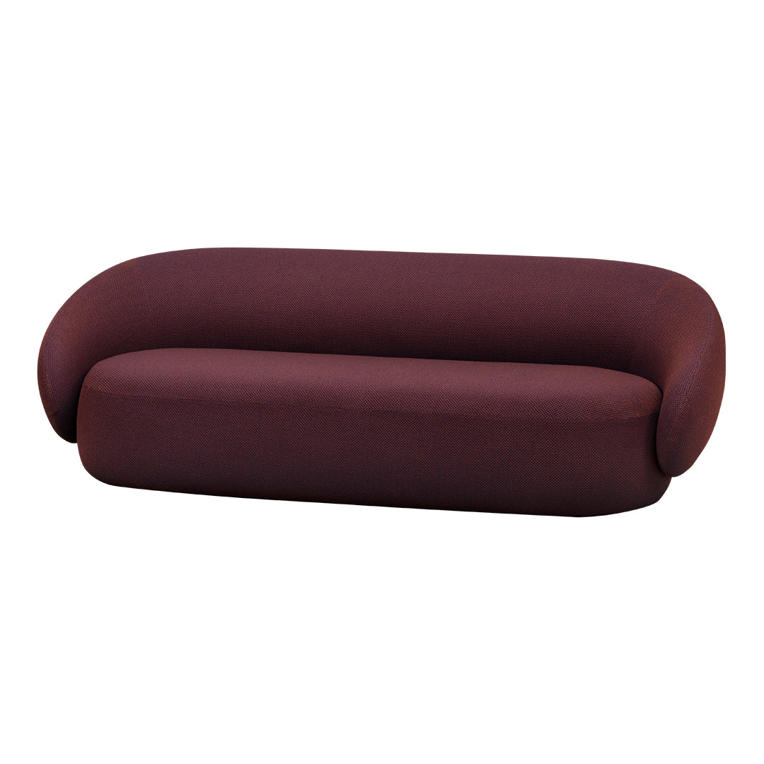 Burgundy curved sofa with a smooth, textured fabric and a minimalist design. Ideal for modern interiors.