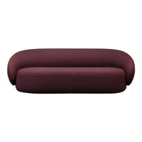 Deep burgundy sofa with a smooth texture and rounded edges, perfect for modern interior decor.