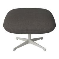 Gray upholstered ottoman with a textured finish and a sleek white base. Stylish and modern home decor accent.