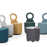 Colorful modern chairs in gray, mustard, teal, and green patterns with a gray rolling table.