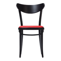 Black wooden chair with a smooth finish and a vibrant red upholstered seat. Modern design, minimal patterns.