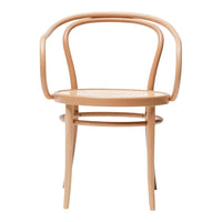 Light natural wood chair with a simple, curved design and a woven seat, showcasing a minimalist aesthetic.