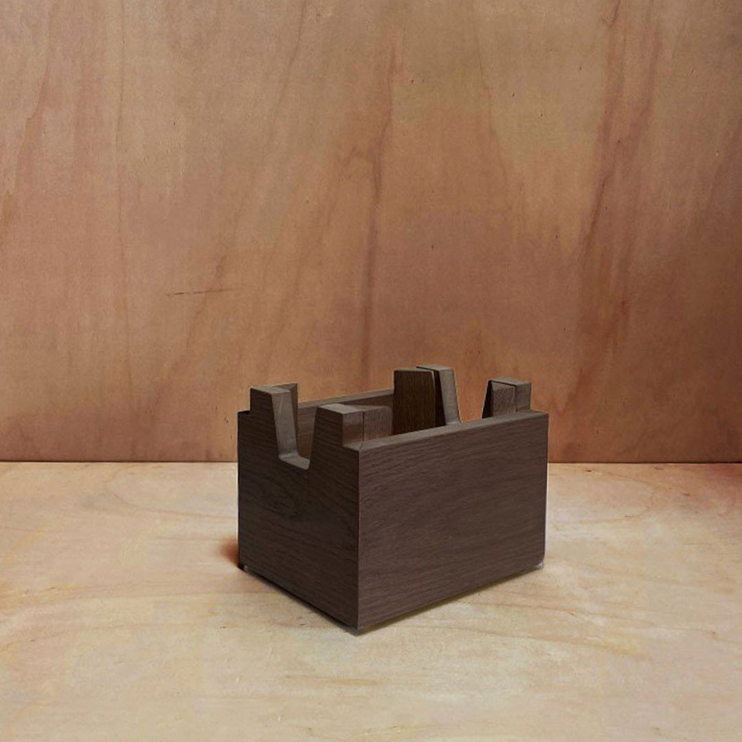 Dark brown wooden box with a minimalist design, featuring clean lines and a smooth finish. Ideal for modern decor.