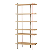 Modern bookshelf with natural wood shelves and contrasting red and white metal frame. Stylish and functional design.