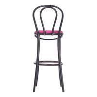 Black wooden bar stool with a pink cushioned seat and a classic curved back design, perfect for modern decor.