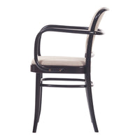 Black wooden chair with a cream upholstered seat, featuring sleek lines and a minimalist design.