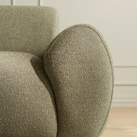 Textured olive green upholstery with a soft, rounded arm design, showcasing a modern aesthetic.